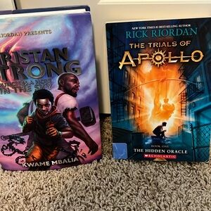 Great books by Rick Riordan, one hard cover, one paperback